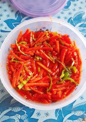 A picture of Gajar ki raiti (gajar ka achar) 🥕🥣.
