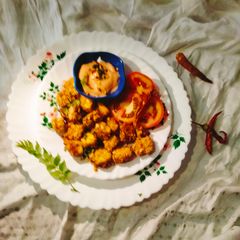 A picture of PANEER POPCORN (Crispy paneer popcorn snacks).