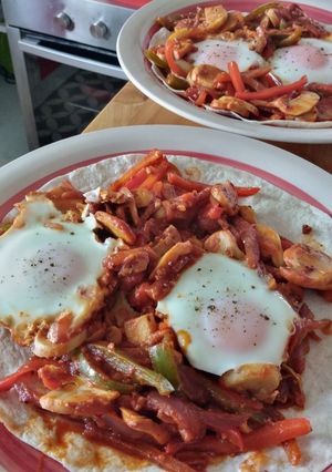 Una foto de Fusión shakshuka ranchera