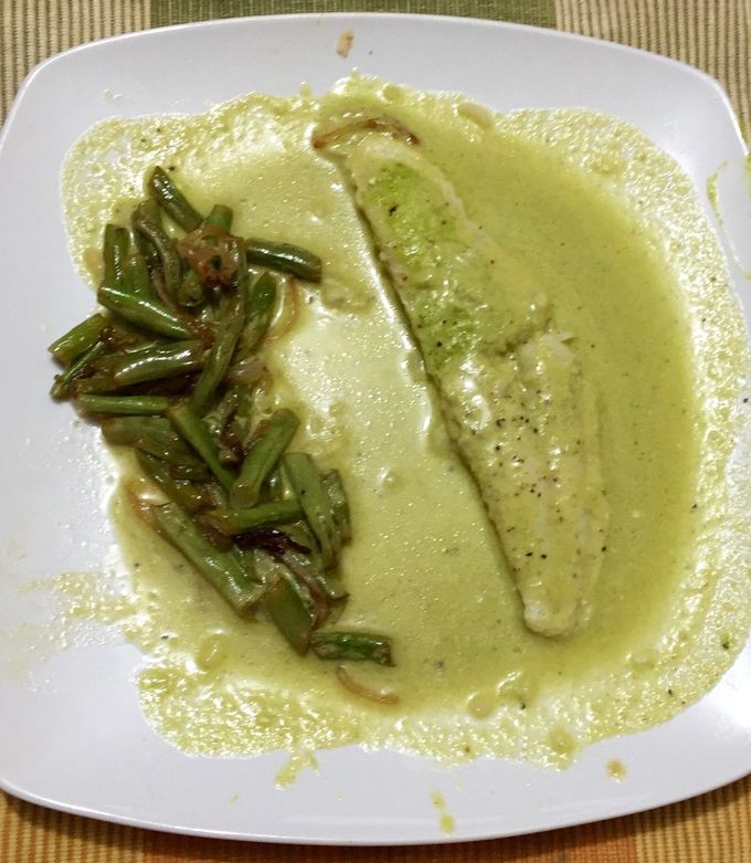 Una foto de Filete de pescado en salsa de cilantro