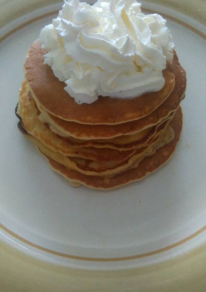 Una foto de Tortitas americanas con nata