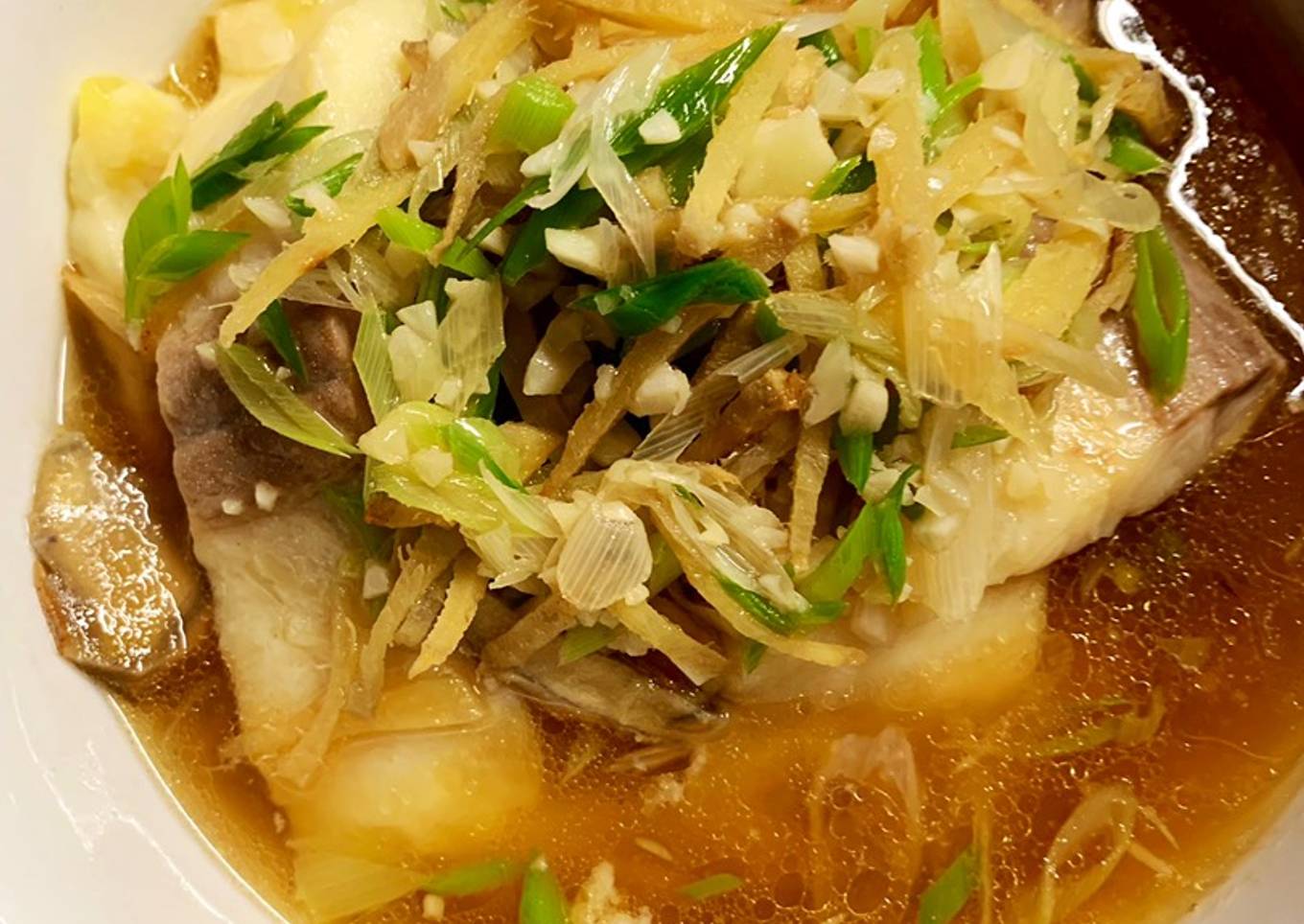 Steamed fish with ginger sauce