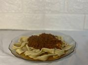 Una foto de salsa de tomate con comino