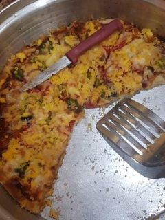 صورة لوصفة بيتزا العشر دقائق 🍕