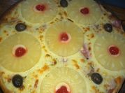 Una foto de pizza agridulce