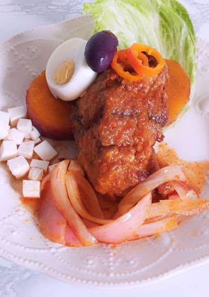 Una foto de Pescado bonito en escabeche 🐟🇵🇪