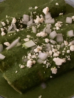 Una foto de Enchiladas de espinaca rellenas de pollo