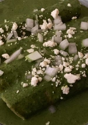A picture of Spinach Enchiladas Stuffed with Chicken.