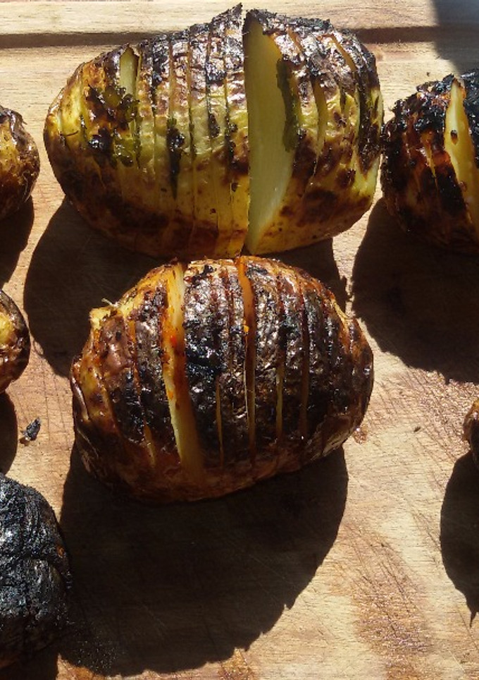 Una foto de Picada de papas a la parrilla