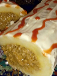 Una foto de Rollo de patata relleno de carne