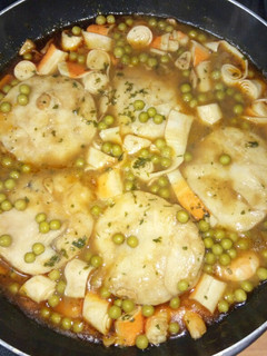 Una foto de Merluza con langostinos y palitos de cangrejo