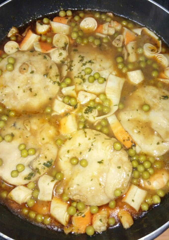 Una foto de Merluza con langostinos y palitos de cangrejo