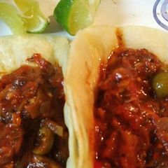 A picture of Cabbage and Chicken with Tortillas.
