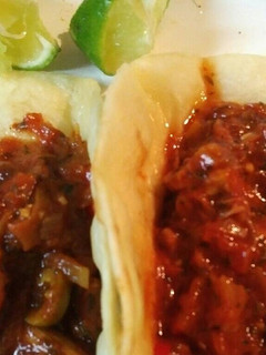 A picture of Cabbage and Chicken with Tortillas.