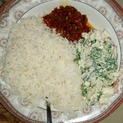 White rice and stew with Salad A picture of White rice and stew with Salad.