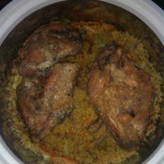 Cus cus with pried chicken A picture of Cus cus with pried chicken.