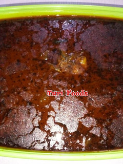 A picture of Banga Soup with Dry fish, Ponmo, Goat meat and Chicken.