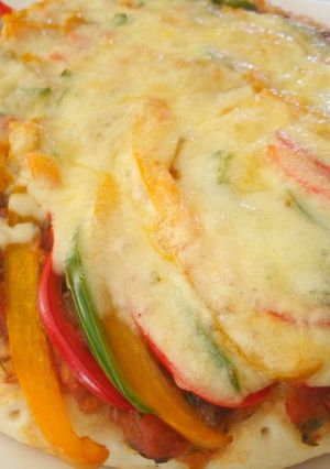 A picture of Veggie and meat pizza.