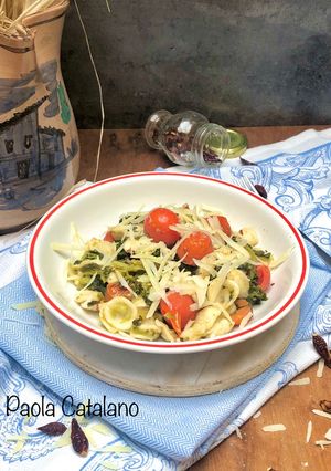 A picture of Orecchiette with Broccoli Rabe and Cherry Tomatoes.