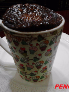 Una foto de Mug Cake de confitura de cereza negra