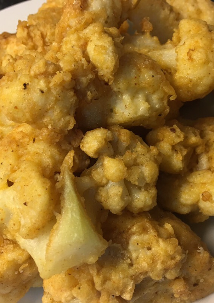 Una foto de Coliflor rebozada con queso Parmesano 🧀
