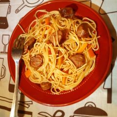 A picture of Spaghetti in sausage strips.