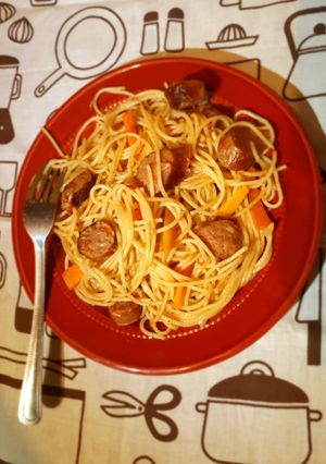 A picture of Spaghetti in sausage strips.