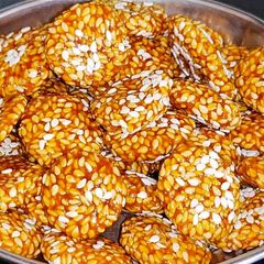 A picture of Til gur ki revdi winter recipe / sesame jaggery rewadi.