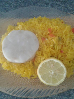 Una foto de Arroz al horno con merluza