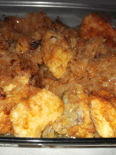 Una foto de Bacalao encebollado