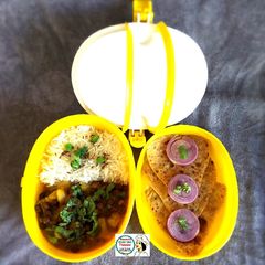 A picture of Mini Lunch - Paratha, Chana Masala, Jeera Rice.