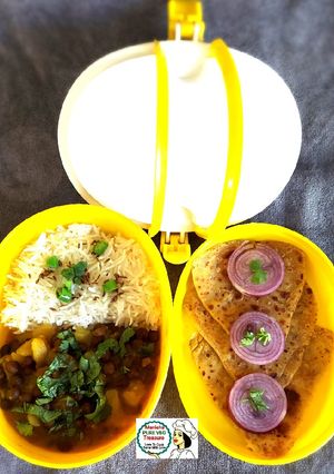 A picture of Mini Lunch - Paratha, Chana Masala, Jeera Rice.