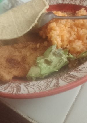 Una foto de Carne empanizada y el arroz ¡sí, señor!