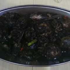 A picture of Masak sotong hitam kuah cemek.