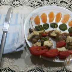 A picture of Grilled Paneer mushrooms on Satay sticks.