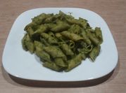Una foto de pesto de rúcula
