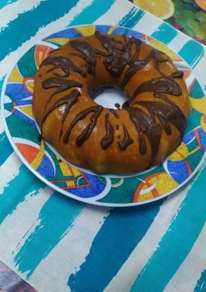 Una foto de Budín marmolado de naranja y cacao hecho en savarín