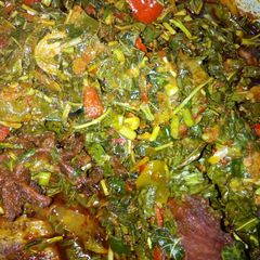 A picture of Spinach with spring onion soup.