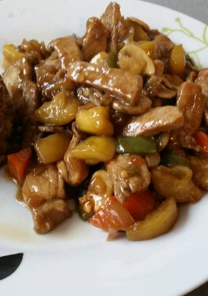 Una foto de Lomo con verduras con salsa de ostras y quinoa