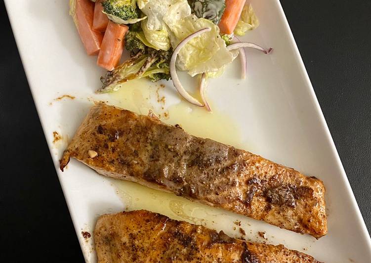 Learn How To Salmon in lemon butter sauce with baked veggies