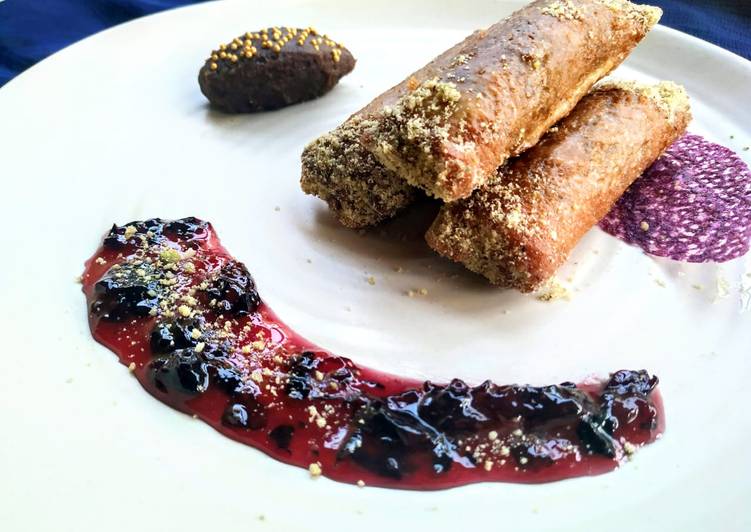 Recipe of Homemade Znoud-el-sit with creamy choco hummus filling and red grape sauce