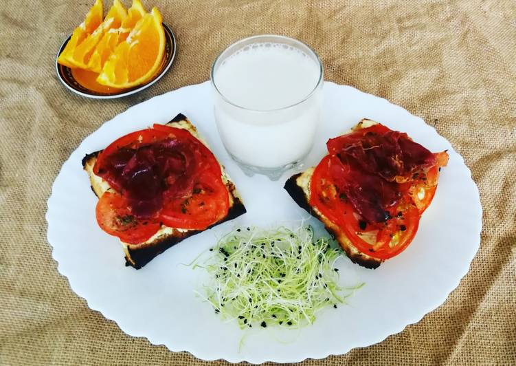 Chapata con queso, tomate y jamón curado crujiente - muy fácil