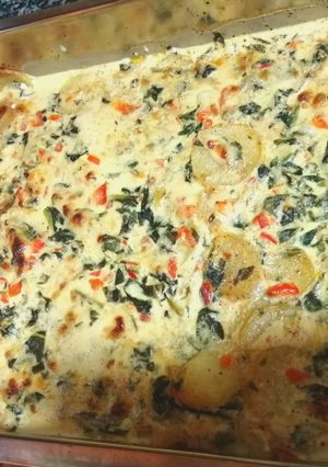 Una foto de Merluza al horno con verduras