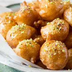 A picture of Loukemades (Zalabya) with Sugar Syrup.