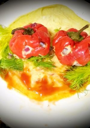 Une photo de Les poivrons rouges farcies aux oeufs,légumes,fromage