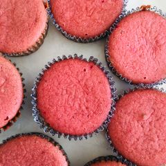 A picture of Strawberry flavored cupcakes.