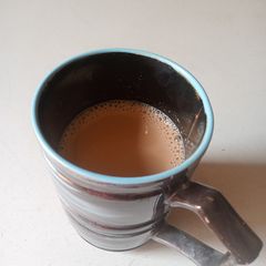 A picture of Chai with jaggery.