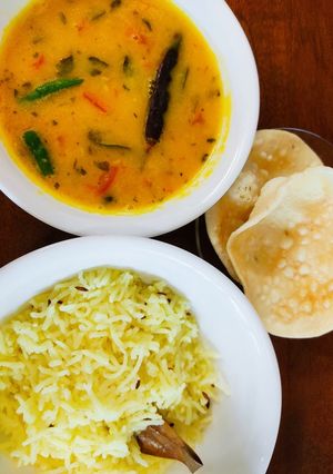 A picture of Dal Tadka with Yellow Rice.