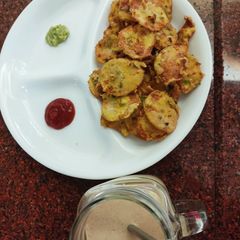 Maaru fritters with tomato carrot salsa A picture of Maaru fritters with tomato carrot salsa.