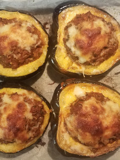 A picture of Acorn Squash stuffed with turkey sausage.
